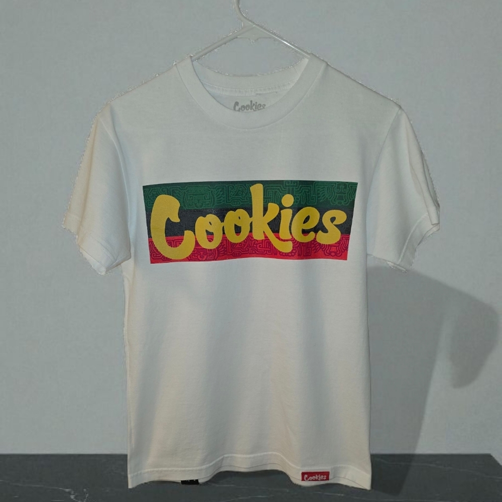 (Cookies)Small White T-Shirt with Multicolor Logo. In Very Good Condition.